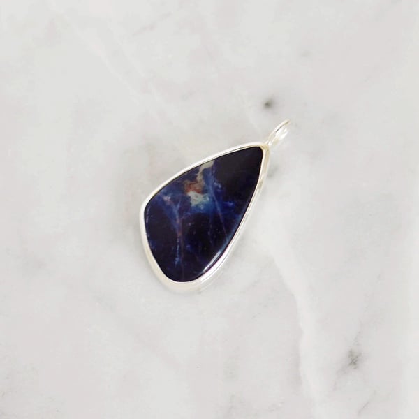 Image of 'Cosmic Lung' Sodalite cabochon cut mixed shape silver necklace no.1