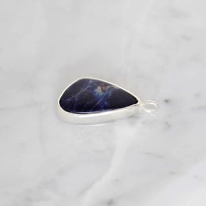 Image of 'Cosmic Lung' Sodalite cabochon cut mixed shape silver necklace no.1