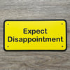 EXPECT DISAPPOINTMENT *Perspex sign*