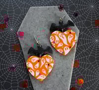 Image 1 of Orange ghosties