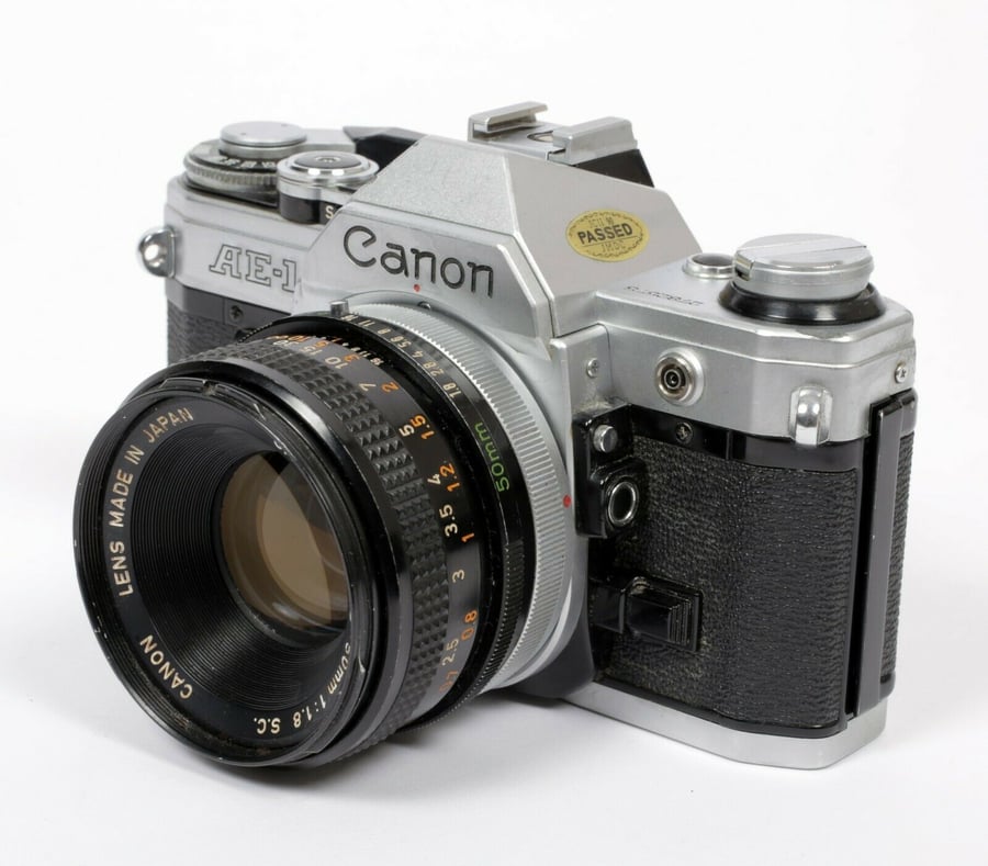 Image of CANON AE-1 35mm SLR Film Camera with FD 50mm F1.8 Lens