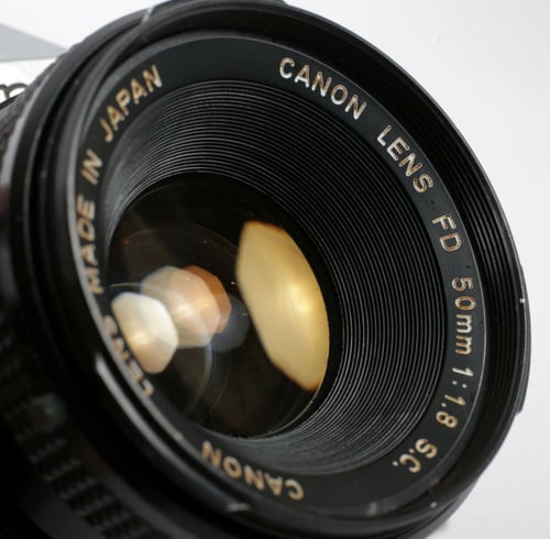 Image of CANON AE-1 35mm SLR Film Camera with FD 50mm F1.8 Lens