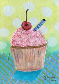 Image 1 of Cupcake with cherry on top