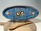 Image of Oval Snake and Moth Serving Plates
