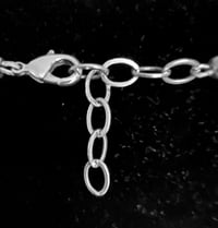 Image 5 of Fleur de lys cross on keshi pearl necklace