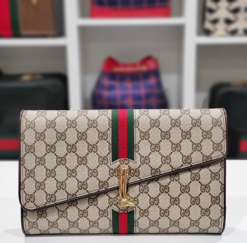 Image of Vtg. Gucci "RARE" Brown Monogram Equestrian Clutch