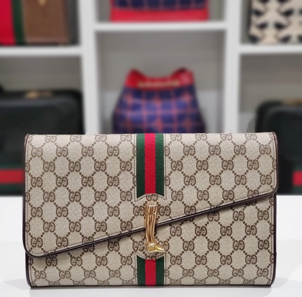 Image of Vtg. Gucci "RARE" Brown Monogram Equestrian Clutch