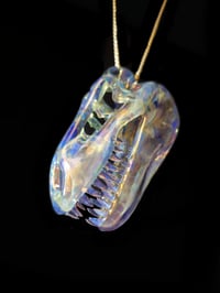 Image 1 of Fully cfl reactive T-Rex skull pendant. 