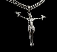 ARMED JESUS PENDANT