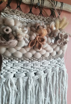 Woven wallhangings in neutrals 