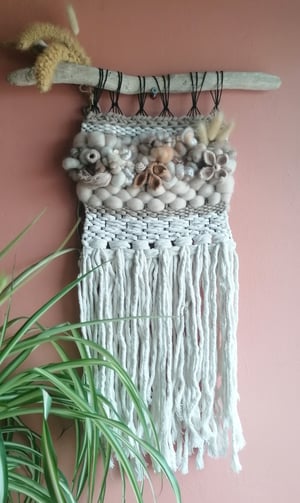 Woven wallhangings in neutrals 