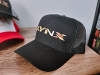 All Black Lynx Logo Trucker Cap