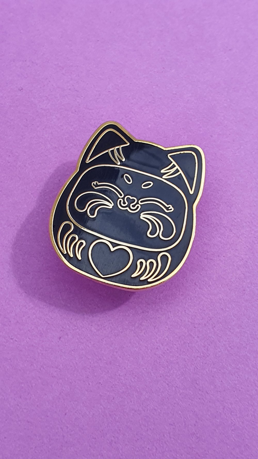 Image of Black darumiau pin