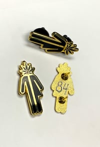 Image 2 of Logo hat pin. numbered 1-100 (black and gold)