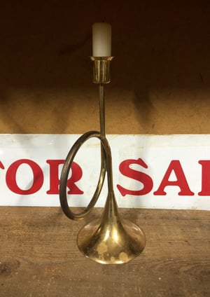 Image of Brass trumpet candlestick