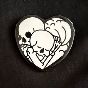 Image of hug 2.25" heart shaped button