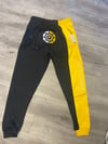 Black and yellow “badge” joggers 