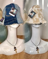 Image 1 of H.O.D. Tan and White Linen Fabric With Denim Panel Reversible Bucket Hat 