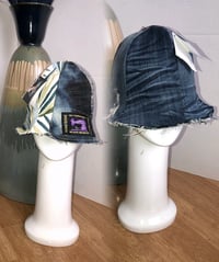Image 1 of H.O.D. Woven Fabric______Distressed Denim Panel Reversible Bucket Hat