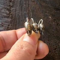 Image 2 of Snapdragon skull earrings - white bronze