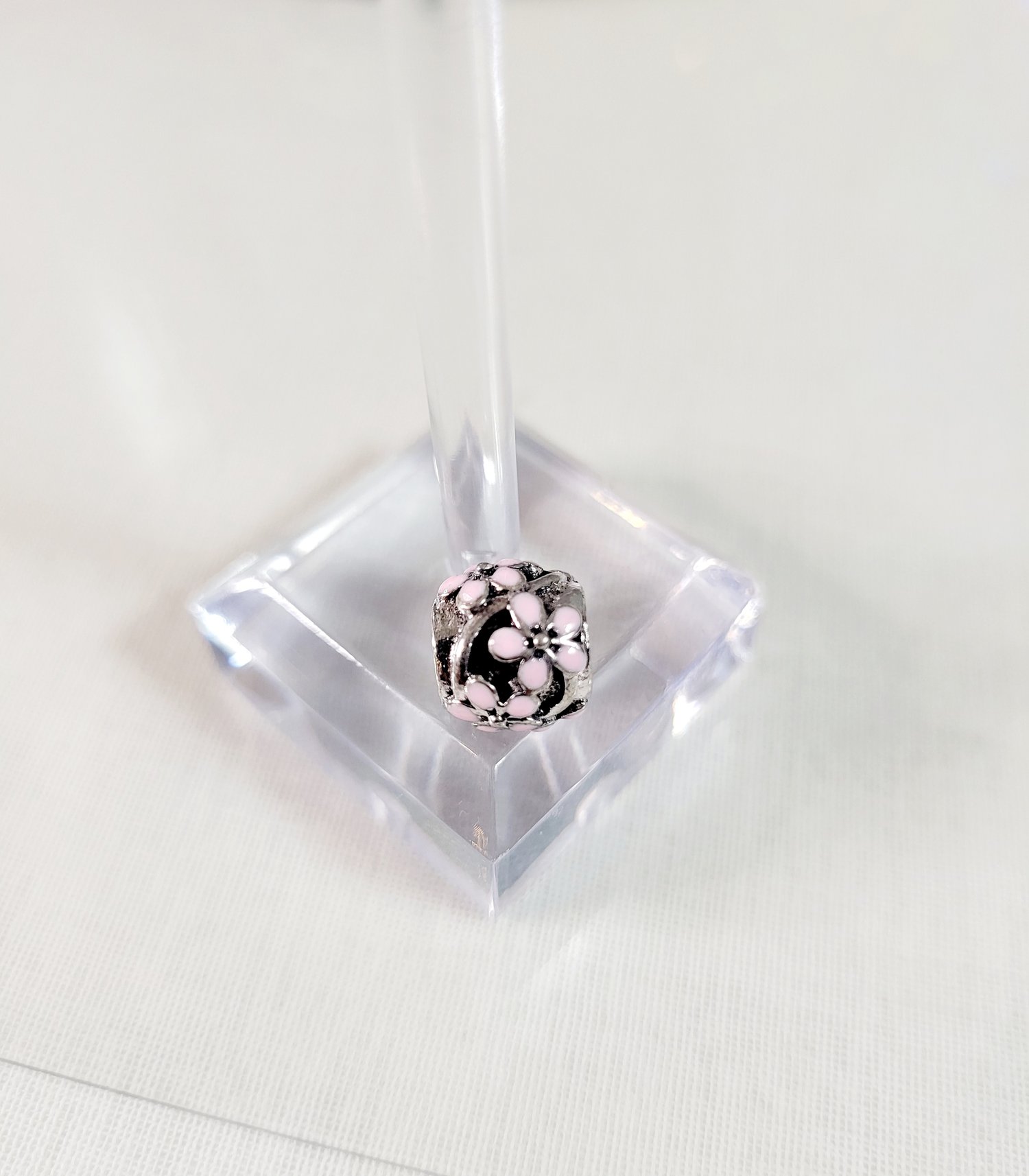 Image of Round Hollow Pink Flowers Charm