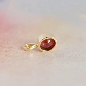 Image of Red Garnet oval cut 14k gold necklace