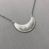 Sterling Silver Prairie Flower Narrow Crescent Necklace