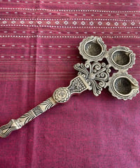 Image 1 of Long carved aarti diya