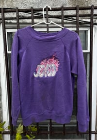 Image 1 of JOYCO over purple 