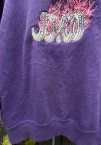 Image 2 of JOYCO over purple 