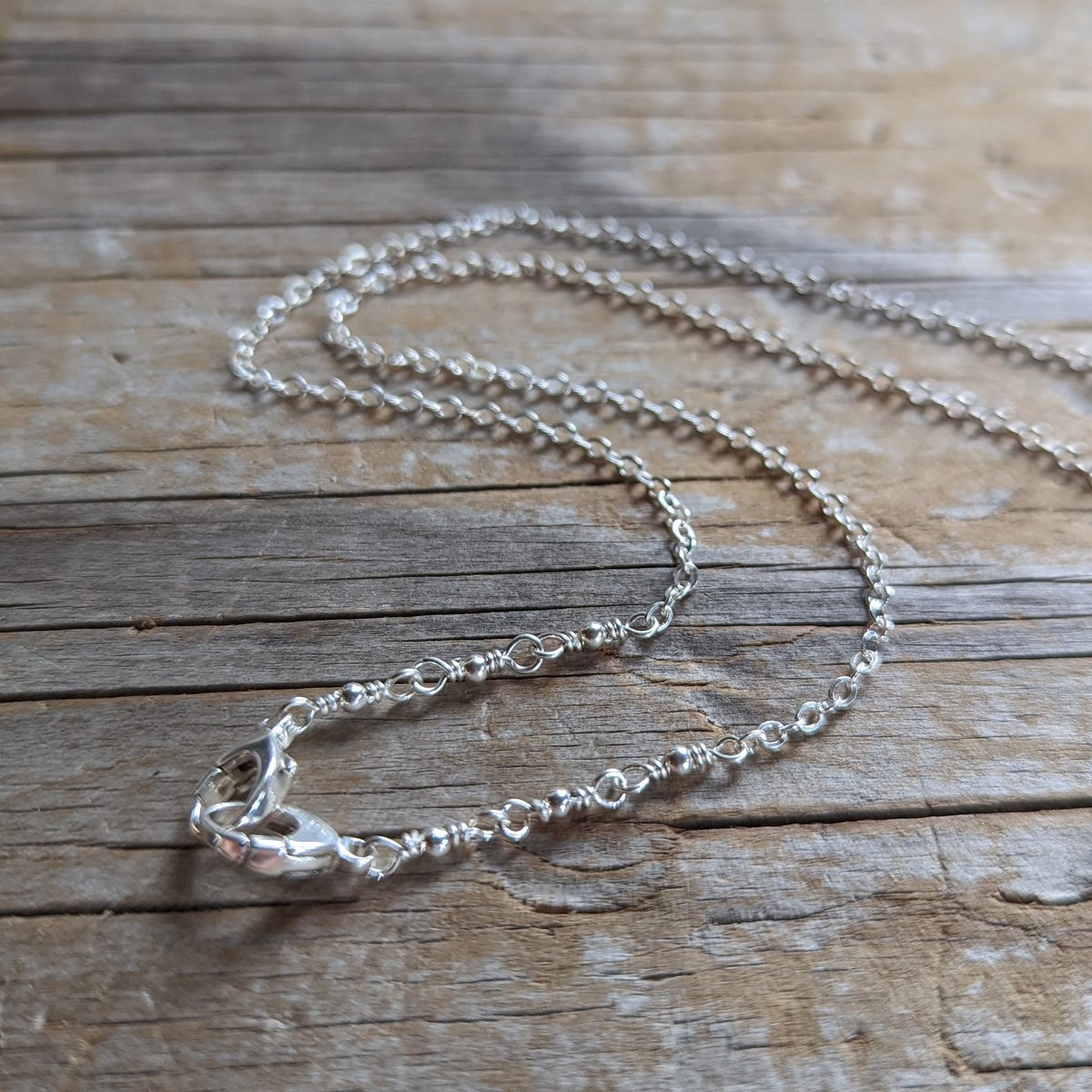 Featherweight sterling silver double clasp chain