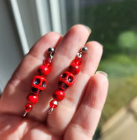 Image 1 of Red Skull Earrings 