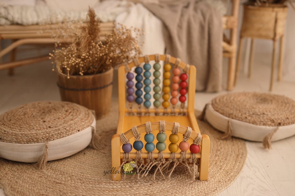 Image of « rainbow bed NB up to sitter with warm amarican oak frame  »