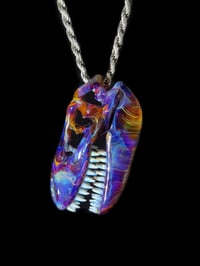 Image 2 of Double amber purple T-Rex skull pendant.