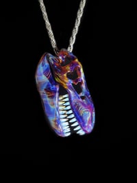 Image 3 of Double amber purple T-Rex skull pendant.