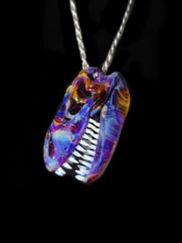 Image 4 of Double amber purple T-Rex skull pendant.