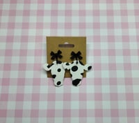 Image 1 of Black and White Cow Clay Bow Earrings