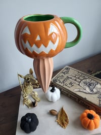 Image 1 of Pumpkin Head Plant Feeder