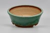 Round bonsai pot in a matte green copper glaze. D.159mm 