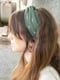 Image of DROPS in green twist headband one size