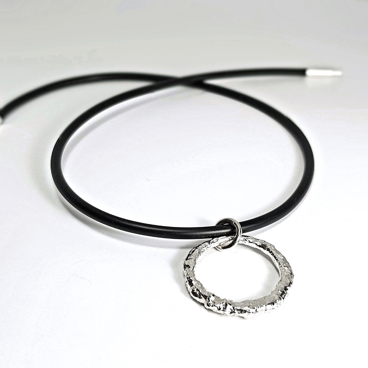 Image of Chunky Silver Circle Pendant, Molten Sterling Silver Statement Pendant with Rubber Necklace