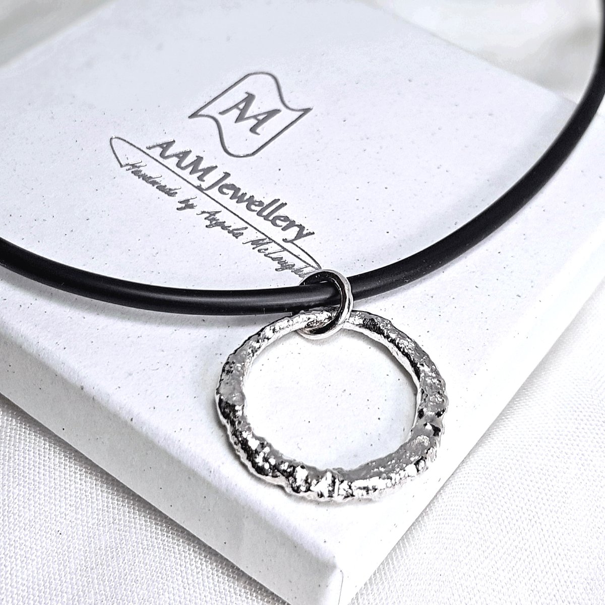 Image of Chunky Silver Circle Pendant, Molten Sterling Silver Statement Pendant with Rubber Necklace