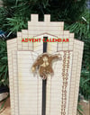 Die Hard Advent Calendar - Hans Gruber Falling off of Nakatomi Plaza
