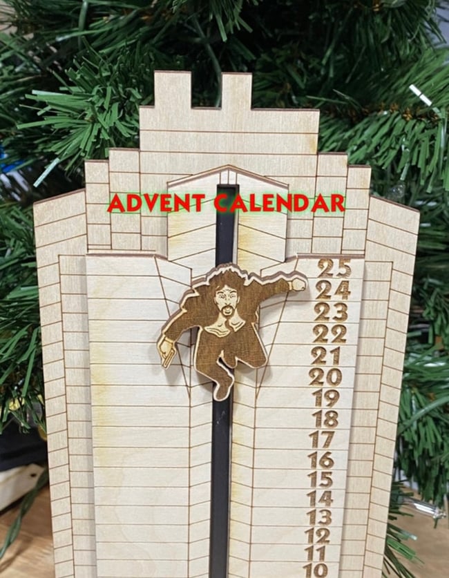 Die Hard Advent Calendar Hans Gruber Falling off of Nakatomi Plaza