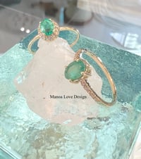 Image 1 of 14k solid gold oval emerald with diamond ring