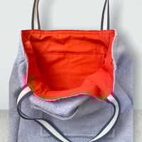 Image 2 of Grey Boucle reversible tote bag orange lining