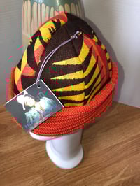Image 3 of H.O.D  Orange, Yellow, & Brown Aztec Woven Fabric W/ Orange  Cable Knit Brim