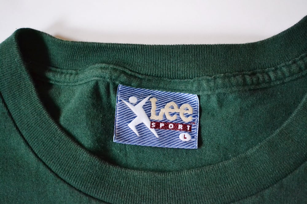Image of Vintage 1990's Minnesota Moose "Goalie View" IHL Lee Sports T-Shirt Sz.L