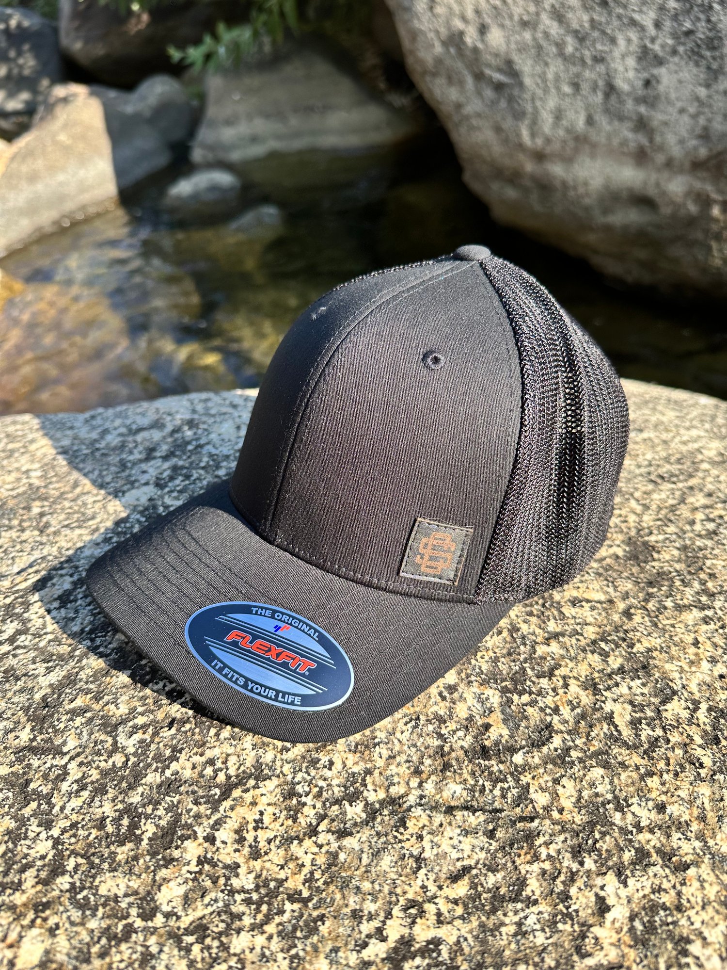 Black Flex Fit Trucker Hat with Black Patch 