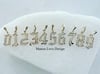 14k solid gold diamond old English style numbers (1-9)